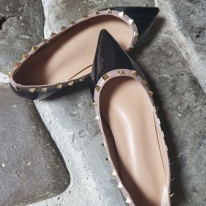 Black studded flats